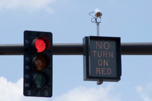 Can running a red light jack up your car insurance rates with a simple picture?