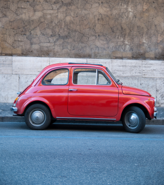A red Italian car