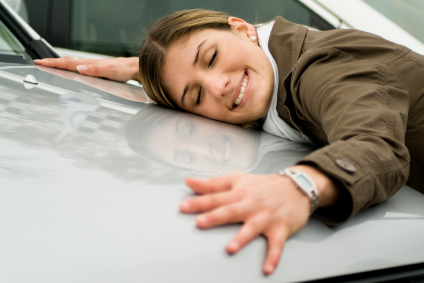 Woman Hugging Her Brand New Car