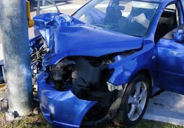 blue car hit utility pole